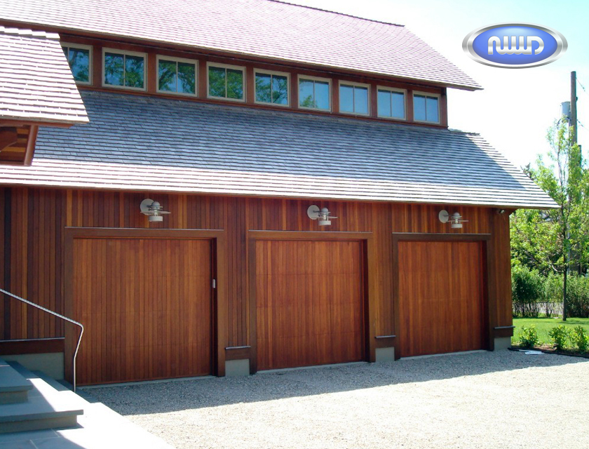 Contemporary garage door with a unique pattern, complementing the modern architecture of the building | Intermountain West Insulation